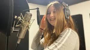 Coalville girl records Christmas song after cancer treatment