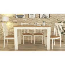 Features solid rubberwood legs supporting an elegant faux marble tabletop. Dining Table Sets The Range
