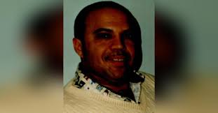Obituary information for Miguel R. Santos