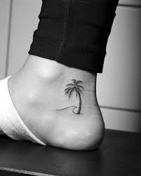 Two vector silhouette of palm trees. 91 Beautiful Palm Tree Tattoo Designs For Tree Lovers