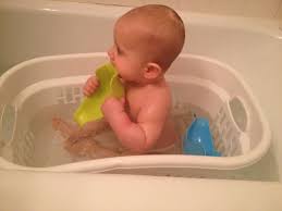 And since wet baby bottoms are slippery bottoms, the tub bottom shouldn't be. Baby Bath Tub Use A Laundry Basket Once Baby Can Sit Up Baby Bath Baby Bath Tub Tub Ideas