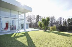 Maybe you would like to learn more about one of these? Modern House Casting Shadows On Manicured Lawn Back Lit Sunny Stock Photo 199747822