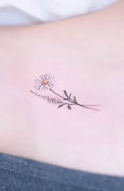 Black outline daisy flower tattoo design for wrist. 30 Beautiful Flower Tattoos For Women Daisy Tattoo Daisy Flower Tattoos Daisy Tattoo Designs