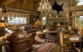 Chic country cabin living room features a black fireplace mantel fitted with brick herringbone firebox situated under a collection of antlers situated next to a brass adjustable floor lamp illuminating a green velvet tufted chair adorned. Rustic Country Living Room Layout Guidelines Interior Design House Plans 35455