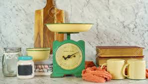 Explore 32 listings for vintage kitchen scales with weights at best prices. Vintage Kitchen Scale Decor And Farmhouse Style Kitchenware With Gypsophila Flowers Against A White Marble Stock Photo Picture And Royalty Free Image Image 124972174