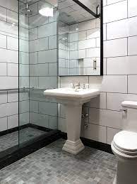 Modernized Art Deco Style And Exquisite Design Sense In This Bathroom By Peter Houghtaling Large Tile Bathroom White Bathroom Tiles White Tile Bathroom Walls