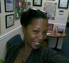 Can you identify all 22 Southeast Baltimore neighborhoods in the collages  in the new Southeast CDC headquarters?