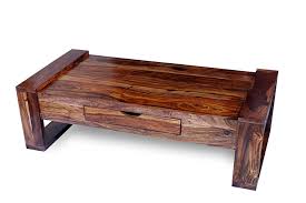 The drawer occupies the whole body of the table; Quartz Wood Center Table Coffee Table With Drawer Living Room Table With Drawer Natural Teak Finish Shagun Arts