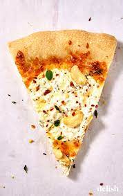 This White Pizza Has A Few Tricks Up Its Sleeve Recipe Pizza Recipes Easy Pizza Recipes White Pizza