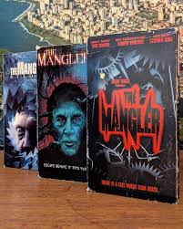 For the discerning connoisseur of utterly bizarre horror cinema, here's the  complete Mangler trilogy on glorious VHS, a true testament to the strange  and misguided ambition of 90s and early 2000s filmmaking.