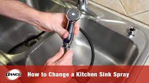 The water supply valve is below the sink in the cabinet. How To Change A Kitchen Sink Spray Youtube