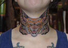 A skeleton hand tattoo rock on, placed on his right arm. 150 Eye Catching Tiger Tattoos An Ultimate Guide August 2021
