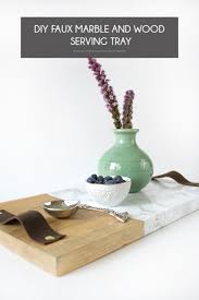 Detailed carving in the oak wood legs and base. Diy Faux Marble And Wood Serving Tray Brepurposed