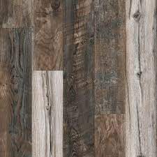 Its wood core also helps it stand up to scratches and dents, meaning it will look great for years to come. Woodland Gathering Water Resistant Laminate In 2021 Home Decorators Collection Flooring Laminate Flooring