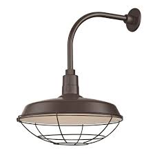 Sporting a gooseneck arm and barn light shade, this fixture strikes a chord between industrial and modern farmhouse design, while ribbed glass details add another layer of interest. Barn Light Outdoor Wall Light Black With Gooseneck Arm 18 Cage Shade