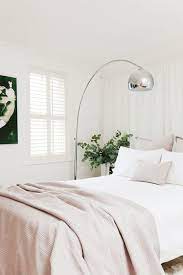 The alternating light and deep pink wall shades look great with the organic white cotton bedspread done up in pink and golden floral designs. 38 Minimalist Bedroom Ideas And Tips Budget Friendly Minimalism