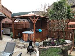 The 8′ by 14′ pergola covering the hot tub is an all fiberglass structure including the 8″x8″ posts, sourced from arbors direct. Hot Tub Shelter Ideas Wooden Gazebos Dunster House