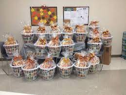 The week before thanksgiving, over 1,400 volunteers put their muscles to work by packaging food into individual thanksgiving grocery bags and loading them onto ups. Florida Peninsula Gives Back Thanksgiving Food Basket Food Baskets For Christmas Thanksgiving Recipes