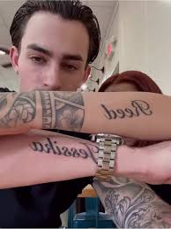 Reed and Jessica Hands Tattoo