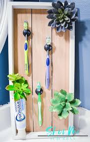 Add in your toothbrushes and you are ready to add this to your bathroom. How To Make A Decorative Toothbrush Storage Unit Showme Suburban