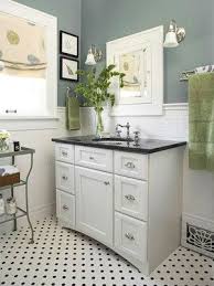 Black And White Flooring With White Vanity And Black Granite Countertop Also Note Whit Small Bathroom Makeover Small Bathroom Decor Black Granite Countertops