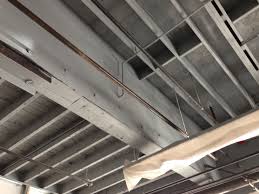 Drywall and drop ceilings tend to make basement spaces look smaller. We Decided To Paint Our Exposed Ceiling Grey We Love How It Looks Already Exposed Ceilings Basement Ceiling Basement Remodeling