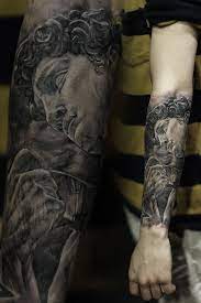Find out more details about his tattoo collection and what the meaning behind some of them are. David Statue Black And Grey Tattoo Statue Tattoo David Tattoo Greek Tattoos