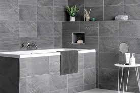 These scintilla ceramic star tiles, 45 x 45cm, from £29.95 per m2, are available in black, blue, orange and green. Beautiful Bathroom Tiles And How To Use Them Loveproperty Com