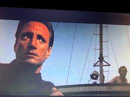 Behind the scenes of the movie Jaws, Quint and Hooper's iconic scene