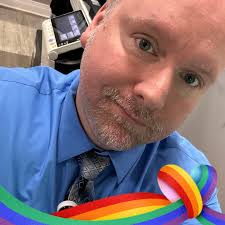 Who is the point of contact for the Greensburg Halloween parade?