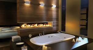 Gas fireplaces generally produce too much heat for a bathroom to make them either practical to use or to meet safety codes as gas fireplaces must not be oversized for the room they're being installed into. 3 Reasons To Include A Fireplace In Your Bathroom Project Inspiration Ideas