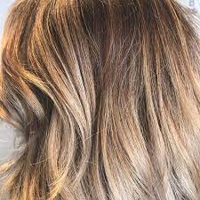 Subtle Balayage Adds Dimension For A Natural Sun Kissed Look Spa Salon Blonde Moments Subtle Balayage