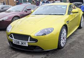 Image result for Cosmopolitan Yellow 2022 Aston Martin