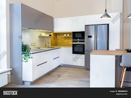 Modern kitchen design is sometimes broadly categorized as any style that's less traditional and more modern design started around world war i and generally featured flat surfaces, geometric forms, and little go shopping. Modern Home Interior Image Photo Free Trial Bigstock