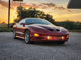 Image result for Sunset Orange 2001 Pontiac