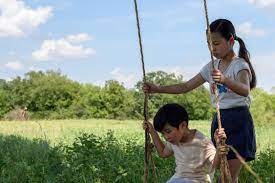 Minari is a beautiful film written and directed by lee isaac chung, based on his own upbringing on a farm in rural arkansas. Minari Film Review Deconstructing The American Dream Teen Vogue