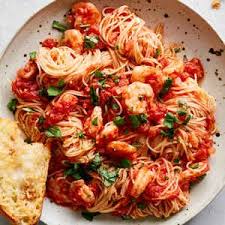 Shrimp Fra Diavolo With Angel Hair Pasta And Asiago Garlic Bread Plated Meals Worth Making Red Sauce Pasta Recipe Spicy Fish Recipe Spicy Seafood Pasta