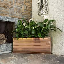 A rather gorgeous and extremely popular rectangular, smooth copper indoor planter, with four claw feet and two brass lions heads. Copper Planter Regart Rectangular Custom Handmade