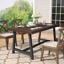Dining room tables have been on our mind lately as my boyfriend te and i work on remodeling the house we found in malibu over a year ago. Tribesigns Outdoor Dining Table Industrial Rustic Solid Wood Patio Dining Table With Heavy Duty Metal Base Perfect For Patio Chairs Not Included Buy Online In Antigua And Barbuda At Antigua Desertcart Com Productid 154991531
