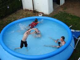 How To Use A Tarp As An Above Ground Pool Cover Hunker Above Ground Pool Cover Pool Cover Pool
