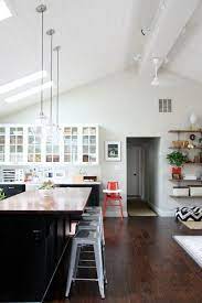 Recessed lighting on vaulted ceilings or sloped ceilings are a refined and classic accent in larger living spaces. Vaulted Ceilings White Or Wood Thewhitebuffalostylingco Com Vaulted Ceiling Kitchen House Tweaking Vaulted Ceiling Lighting