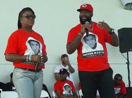 An image of trayvon martin was prominently displayed behind the child who recited the pledge of allegiance on thursday at the democratic national convention (dnc). George Zimmerman Files 100 Million Lawsuit Against Trayvon Martin S Family
