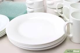 I need to reorganize my kitchen badly and was going to do a cupboard at a time. 4 Ways To Arrange Dishes In Kitchen Cabinets Wikihow