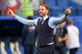 Gareth southgate conducts the crowd as they sing a song to him. Gareth Southgate M S Waistcoat Sales Double As Fans Gear Up For Semi Finals And This Is How To Get 15 Off Yours Mirror Online