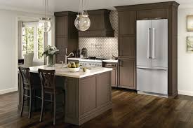 Cherry Doors In Baltic Create A Refined Kitchen That Combines Clean Lines With Soft Accents T Home Depot Kitchen Remodel Kitchen Remodel Kitchen Cabinet Design