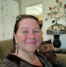 Traces of Texas reader Sandy Puryear graciously sent in this photo of  herself (far right) and Kris Kristofferson in 1973. Says Sandy: "I was  crushed to hear of the passing of Kris