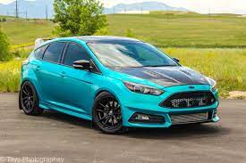 Gloss Atomic Teal Wrap On Ford Focus St By Sharp Wraps Ford Trucks Ford Truck Models Ford Focus St