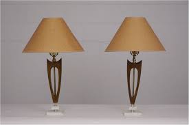 The conical lamp body is further accentuated with a turned wood neck. Pair Of Mid Century Modern Wood Marble Table Lamps