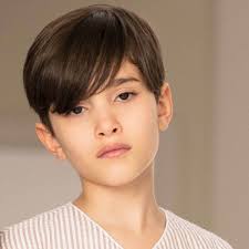 So, if you have been looking to add a touch of interest to your hairstyle, sweep it to a side and add that element of style and drama to the overall look. 28 Coolest Boys Haircuts For School In 2021