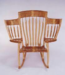 A Wooden Three Seater Storytime Rocking Chair Designed By A Dad Whose Lap Wasn T Big Enough For All Of Hi Rocking Chair Egg Swing Chair Outdoor Wicker Chairs